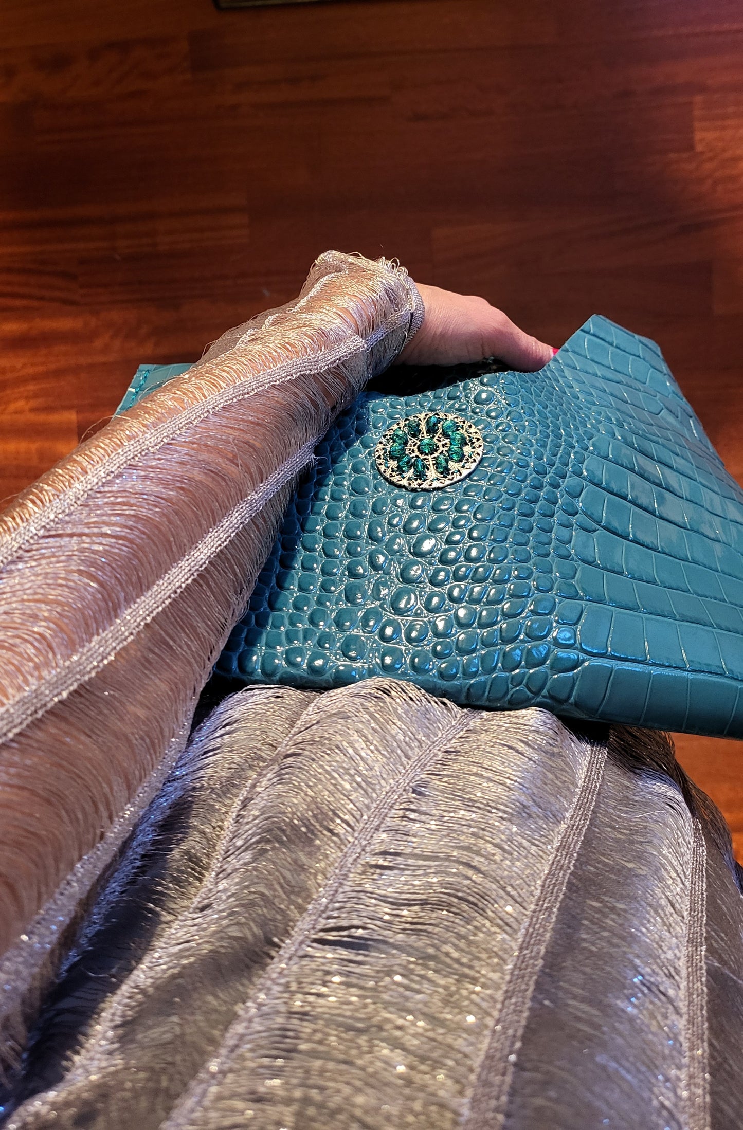 Turquoise clutch bag