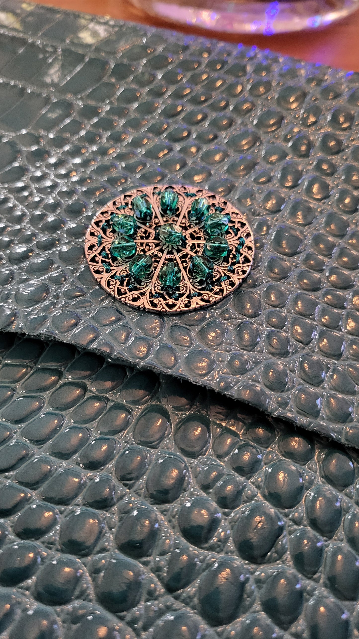 Turquoise clutch bag