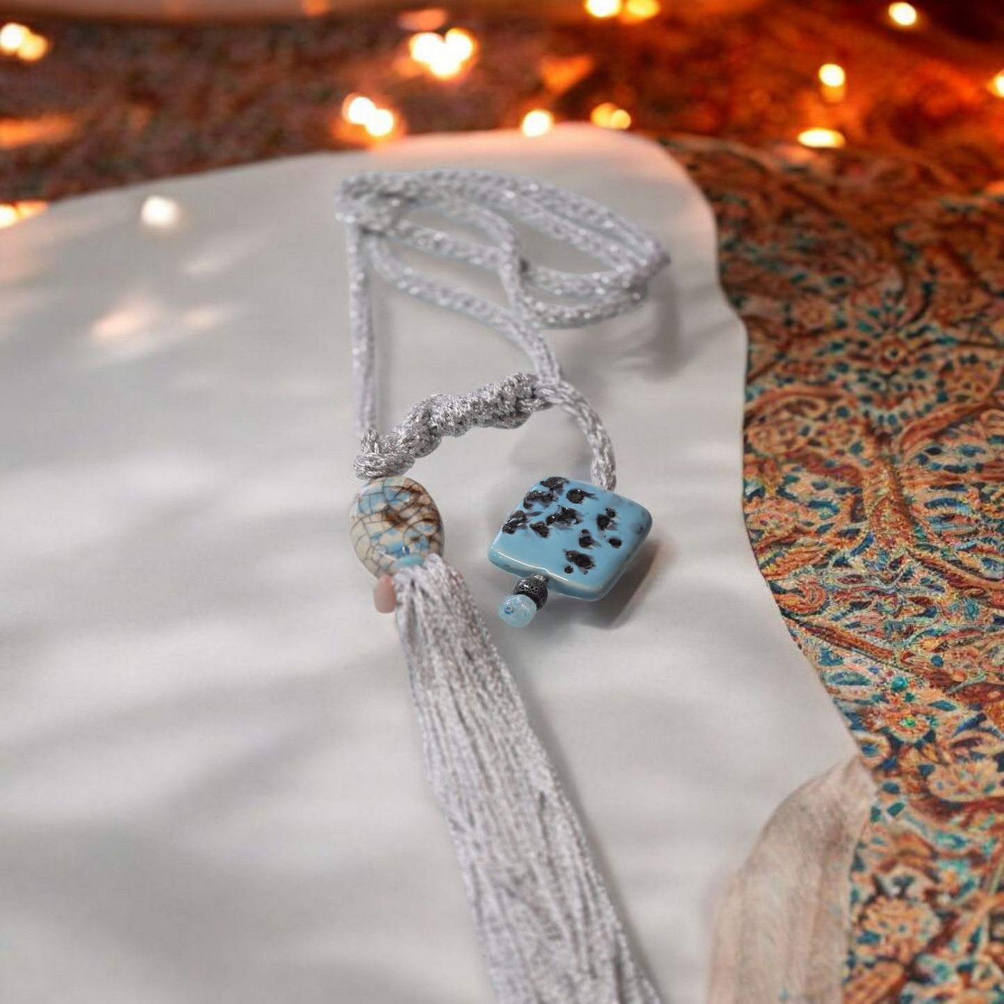 COLLANA artigianale con ciondolo in ceramica e nappina