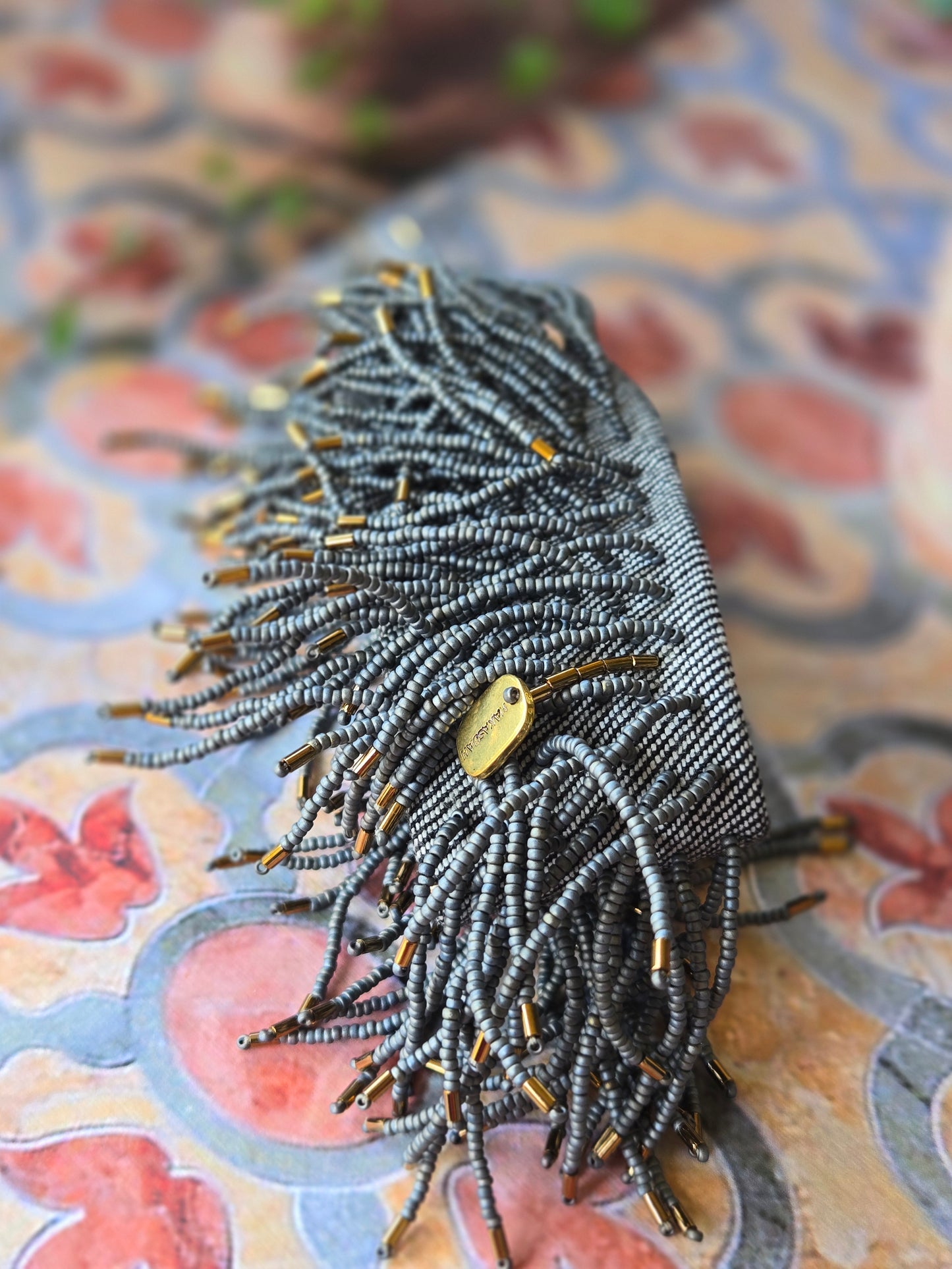 BRACCIALE - con frange in perline