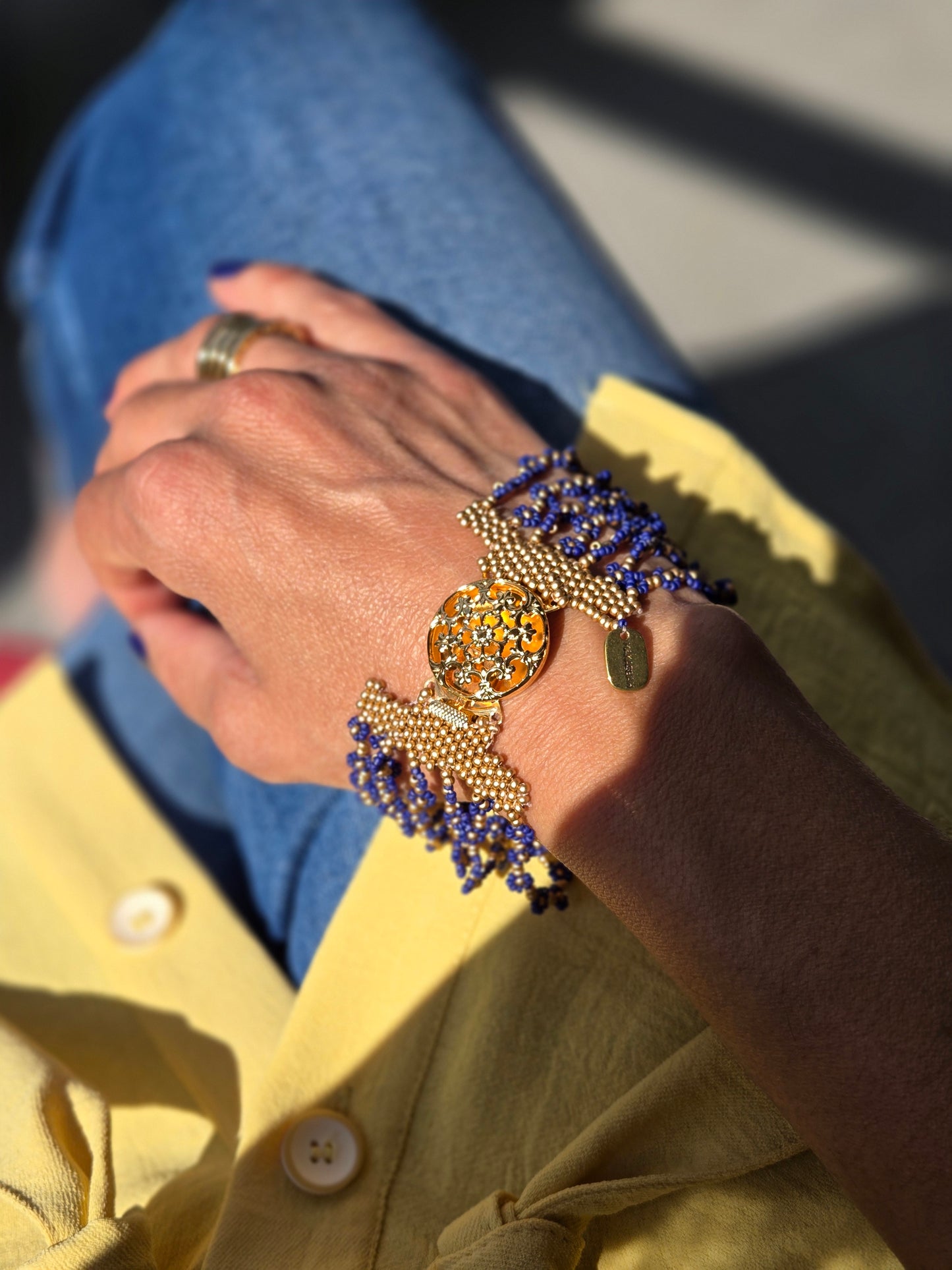 Arabesque leather and pearl bracelet