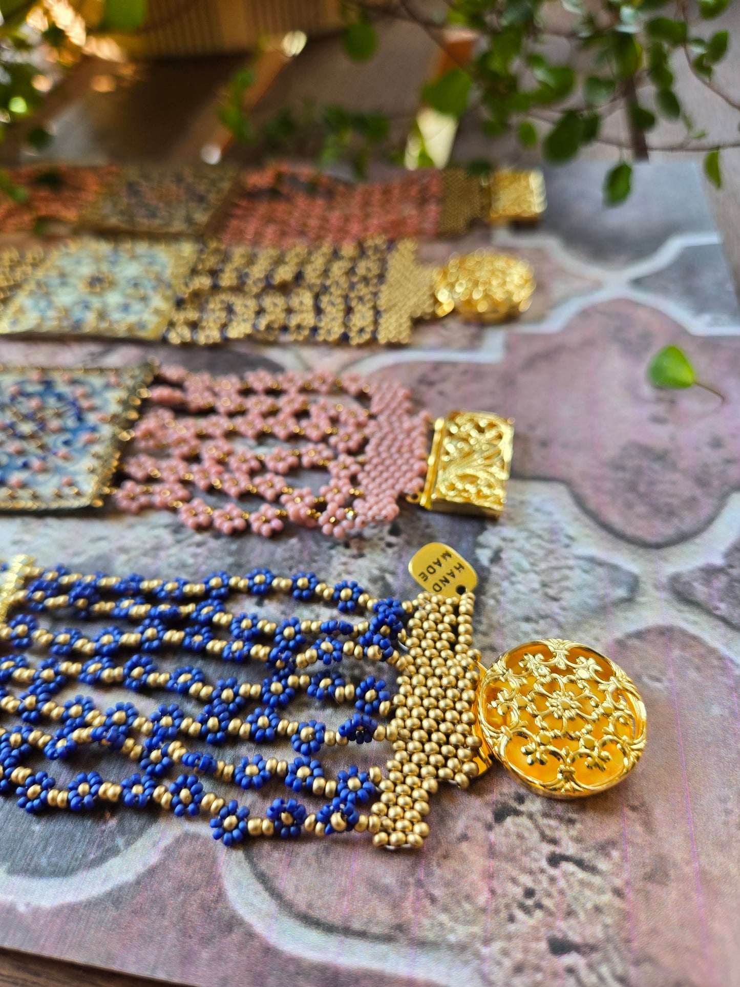 Arabesque leather and pearl bracelet