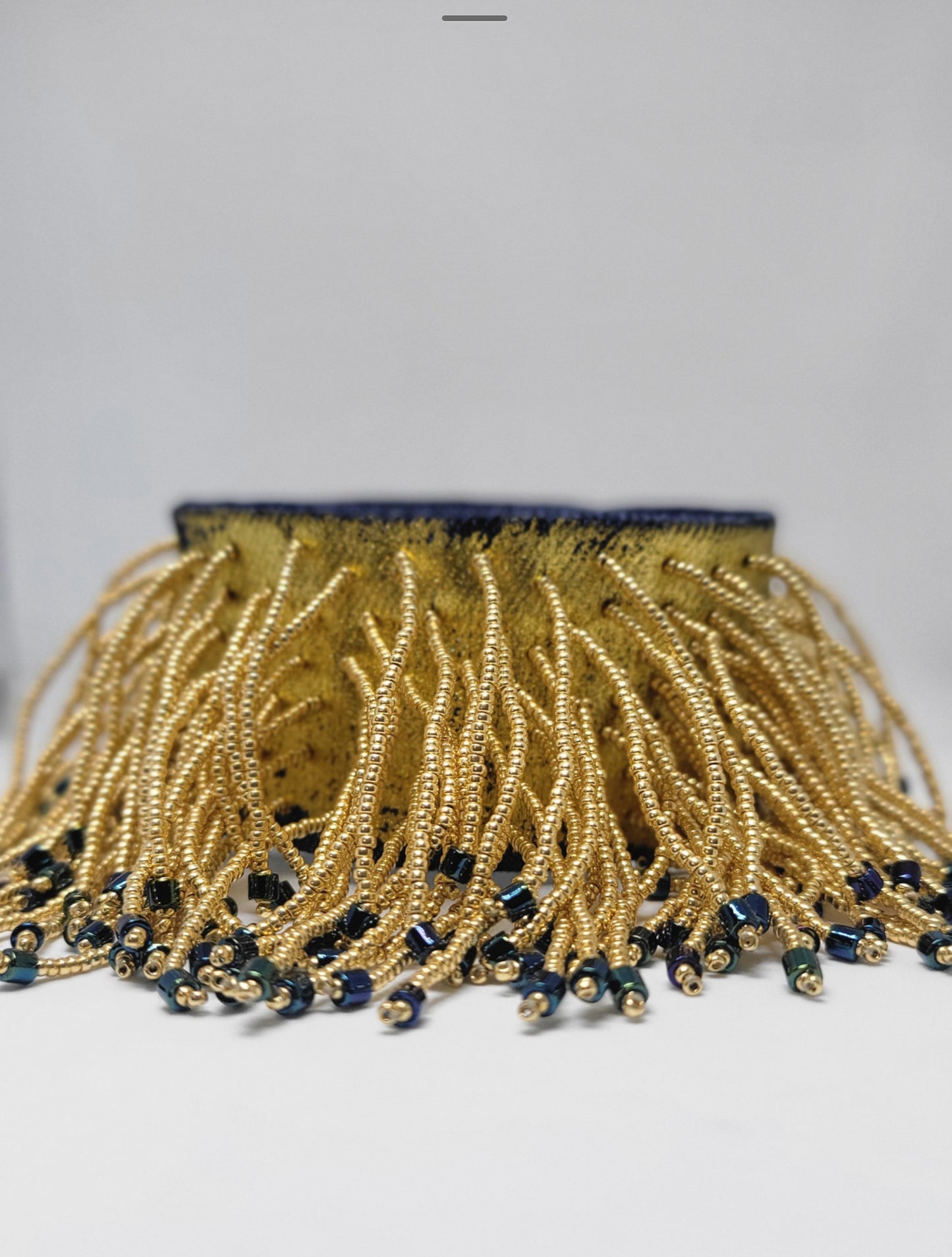 Bracelet en or avec franges perlées