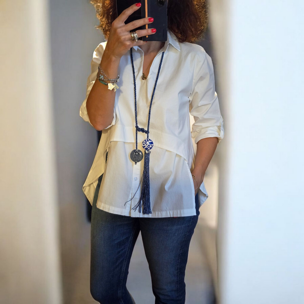 Collier artisanal avec pendentif en céramique et pompon