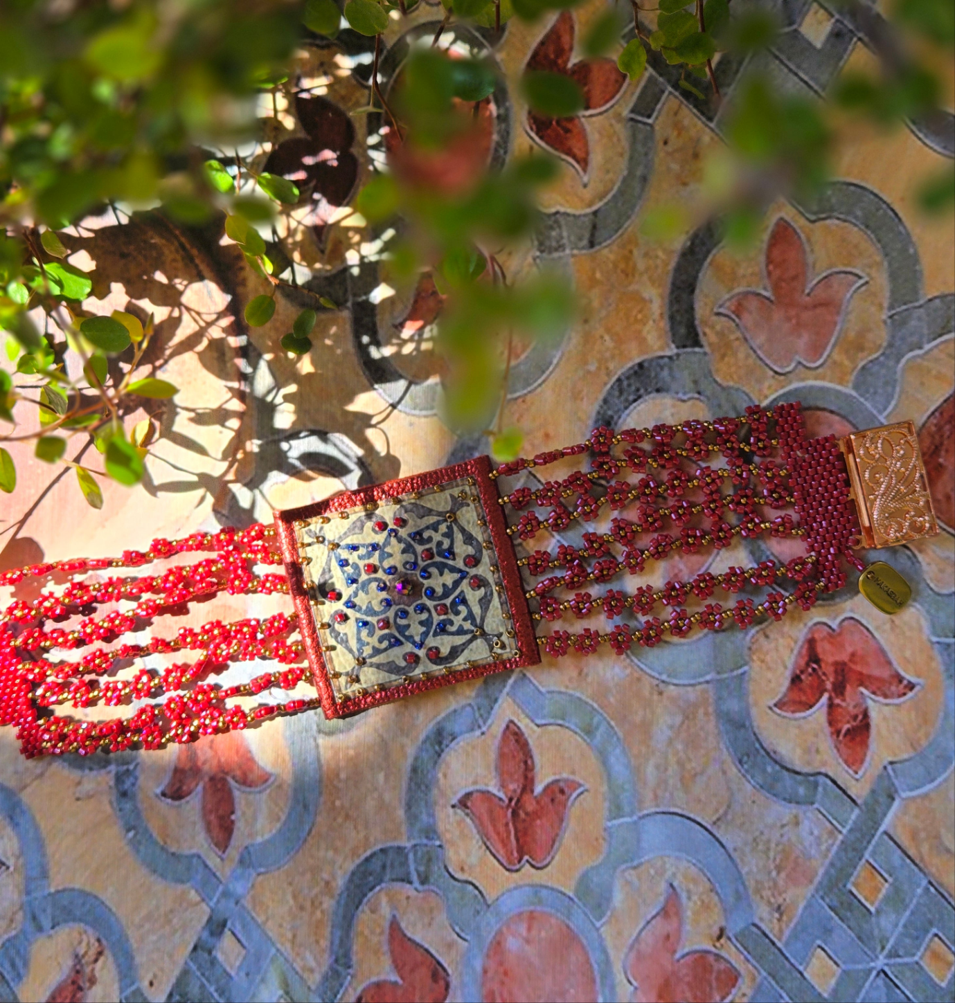 Arabesque leather and pearl bracelet
