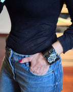 BRACCIALE in Pelle Nera con Chiusura a Forma di Mano di Fatima
