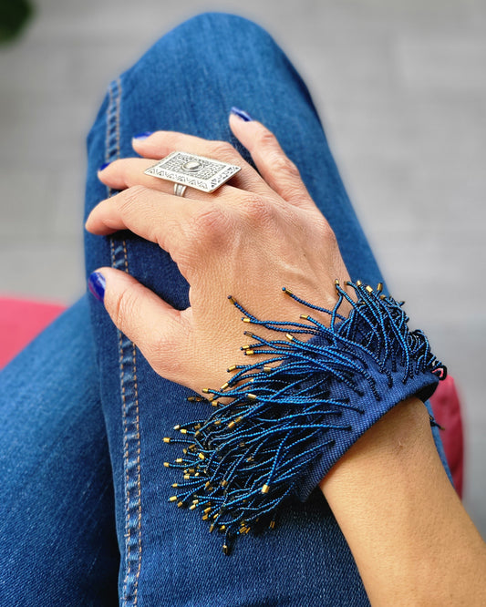 The arabesque rings in aged steel