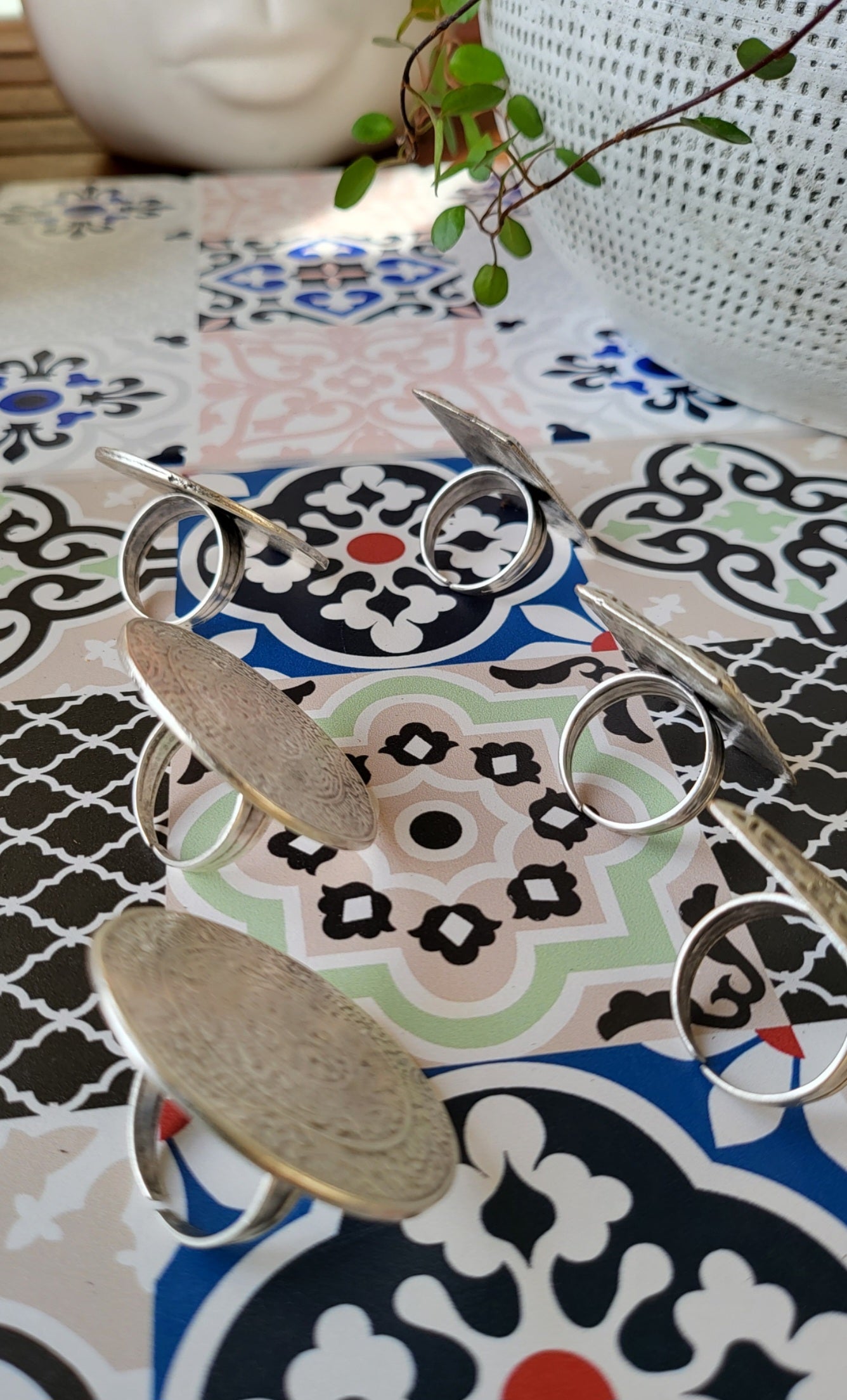 The arabesque rings in aged steel
