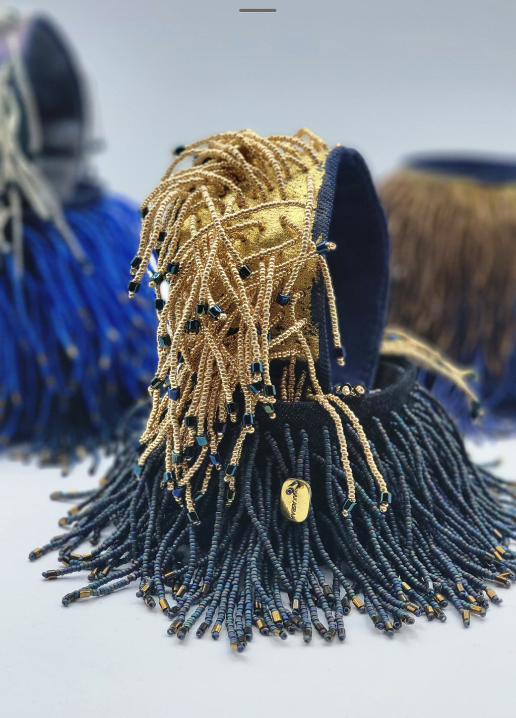 BRACELET with beaded fringes