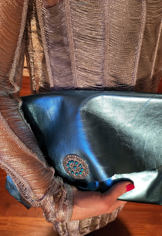 Metallic blue clutch bag