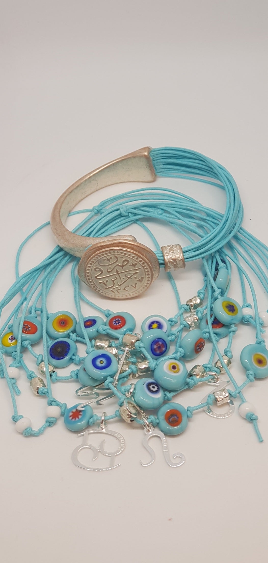 031 - Bracelet semi-rigide avec pièce arabe