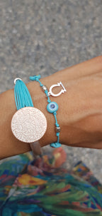 026 - BRACCIALE semirigido con moneta Araba